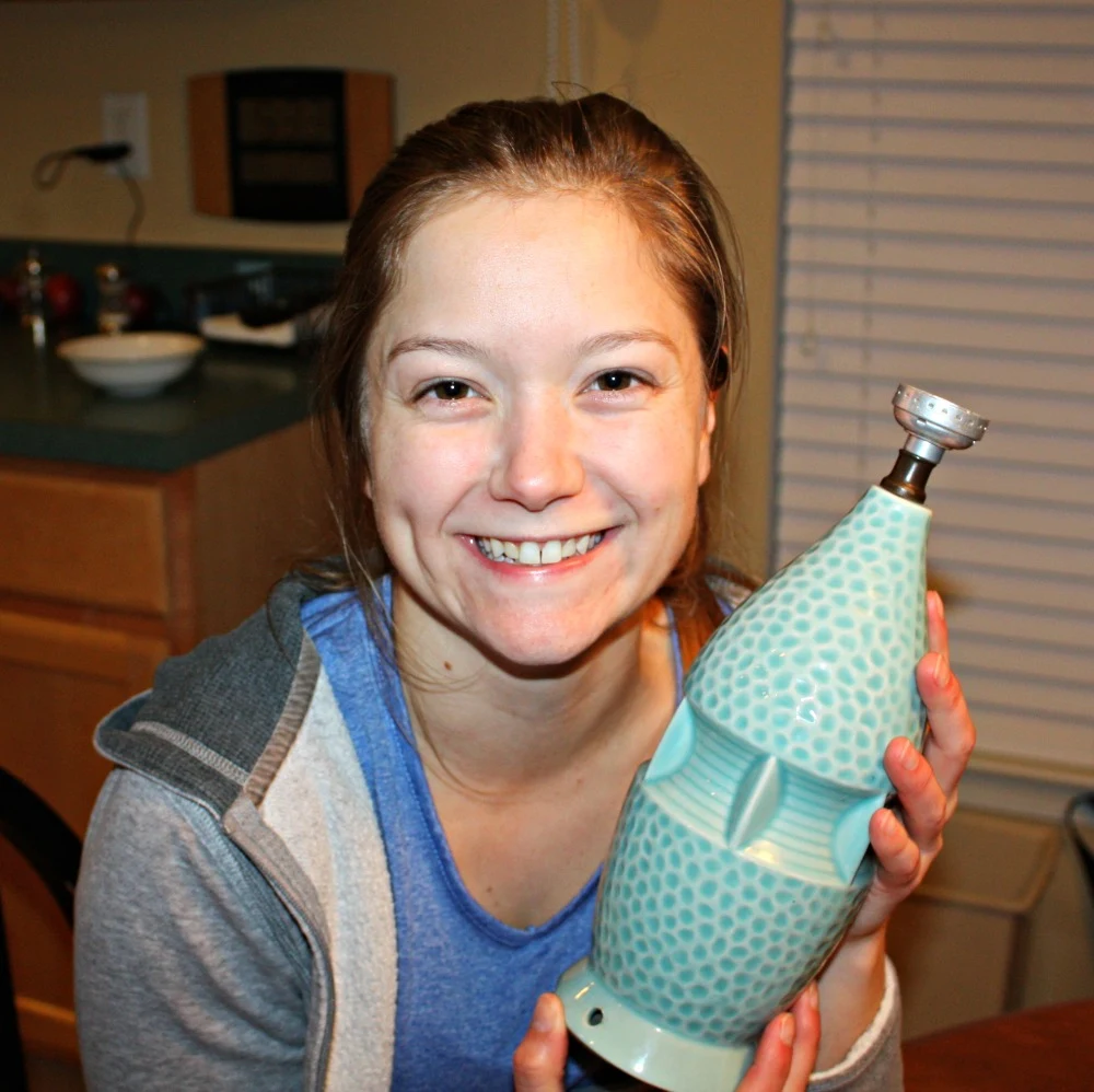 Girl excited to rewire a lamp