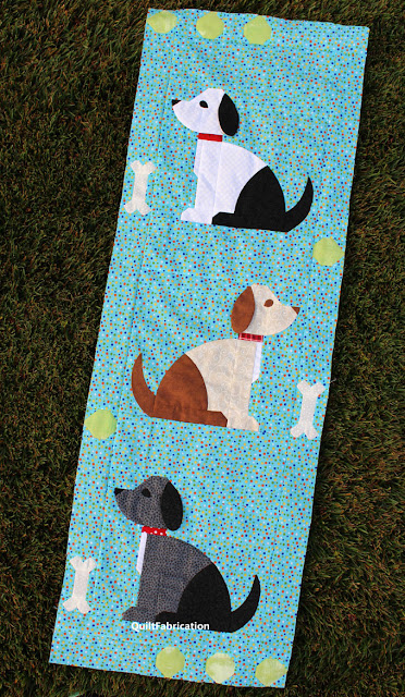 dog quilt blocks along with bones and tennis balls