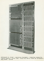 A black and white photograph of a relay rack.