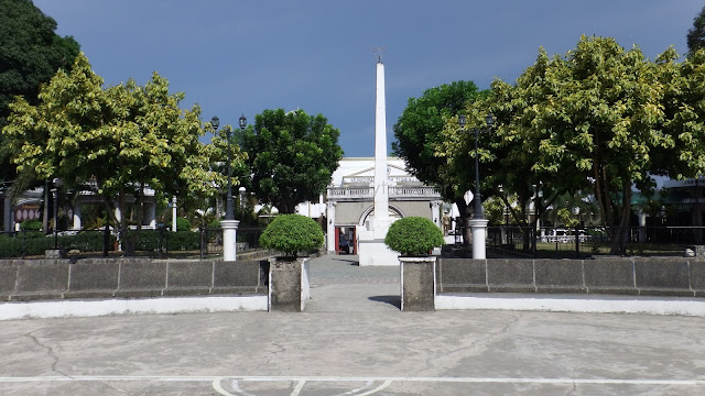 plaza view of Tigbauan Municipal Hall and Rizal Monument