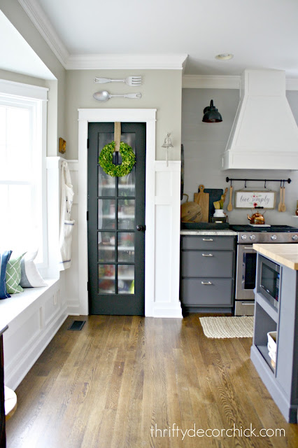 Black pantry door with glass