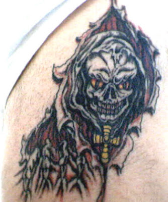 Skull Tattoo Designs - Dare to Compare What does the grim reaper convey to