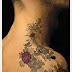 Purple Brownish Colored Flower Tattoo For Men