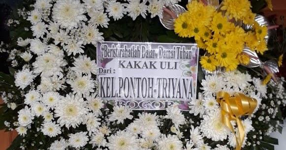 Jual karangan bunga peti di Jakarta