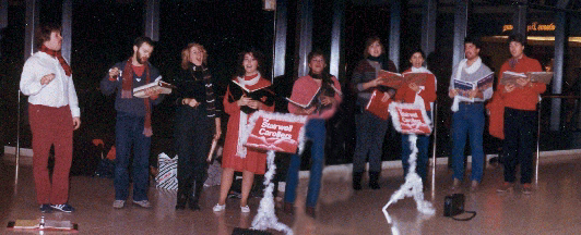 Stairwell Carollers singing in Rideau Center overpass