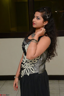 Shrisha Dasari in Sleeveless Short Black Dress At Follow Follow U Audio Launch 043.JPG