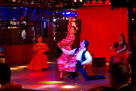 four Flamenco performers on stage