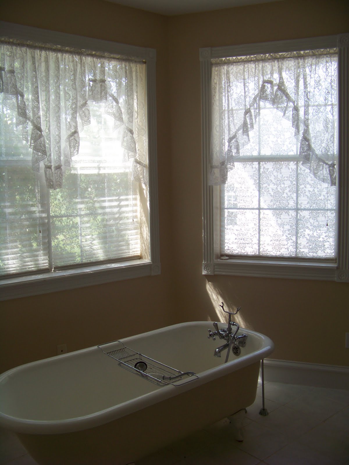 cottage style bathroom This one sits in a space with a lot of windows.