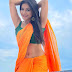 Sakshi Agarwal displays her sculpted abs in designer sarees.