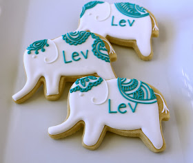 white and teal elephants