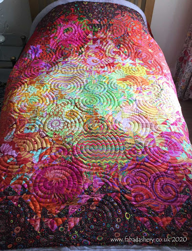 Meg's Shimmering Triangles Quilt