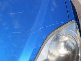 Key scratches on hood of Honda Civic before repairs at Almost Everything Auto Body