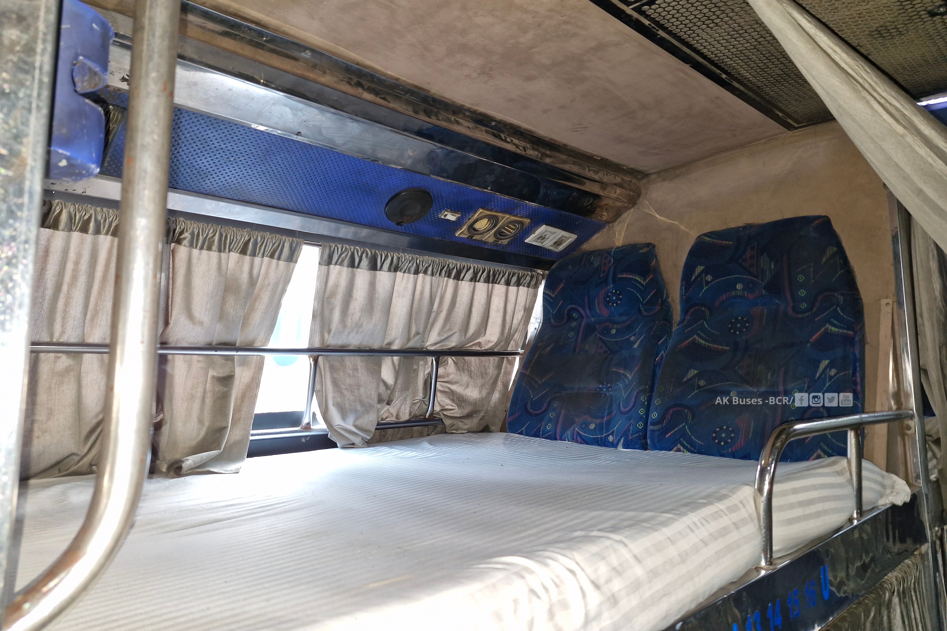 Mahendra heavy green sleeper Bus interior