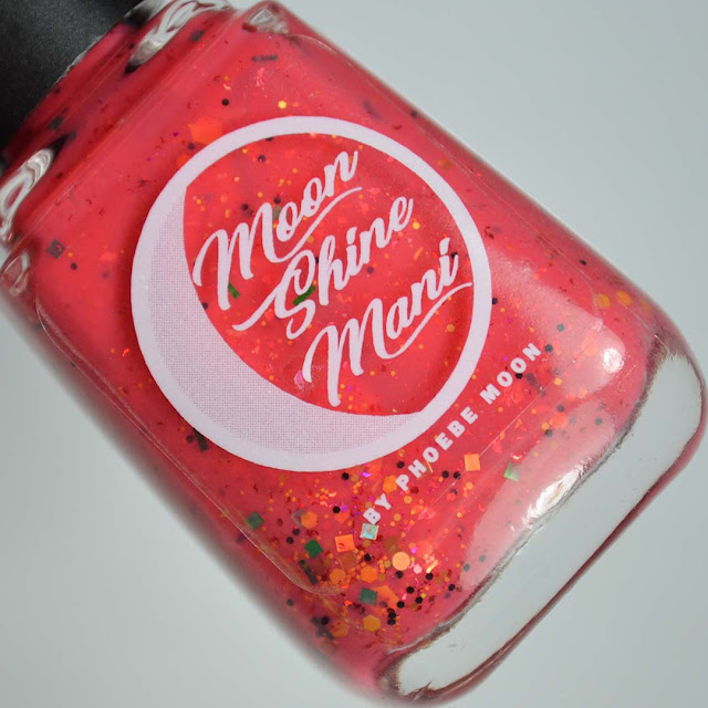 bright coral glitter nail polish in a bottle