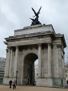 Wellington Arch, a triumphal arch topped with a bronze figure, near Hyde Park in London