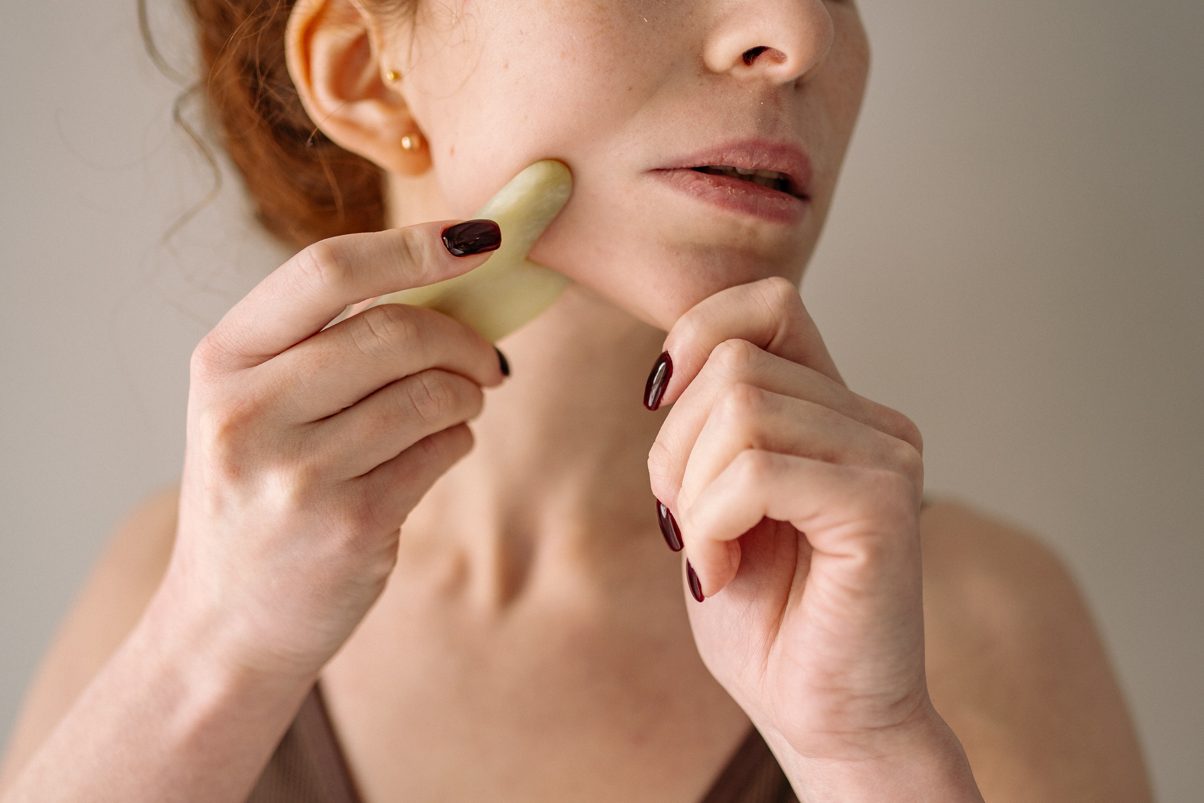 Benefits of Gua Sha: An Ancient Healing Technique, which translates to "scraping sand" in Chinese, involves using a smooth-edged tool to apply pressure and scrape the skin gently.