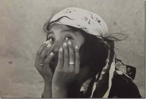 girl covering face