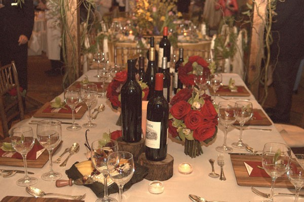  slabs of wood make great stands for wine bottles or centerpieces