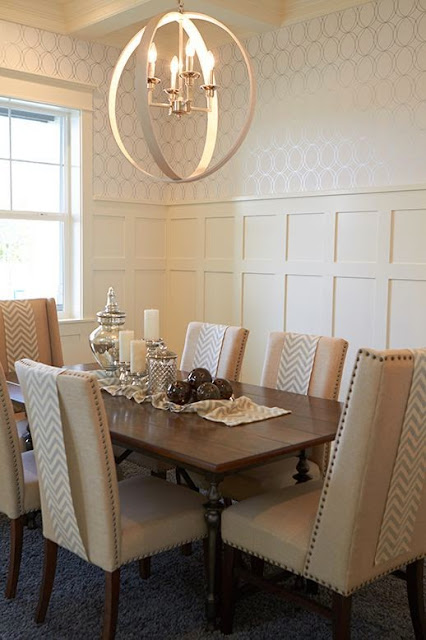 beautifully decorated dining room orb lighting chandelier cream