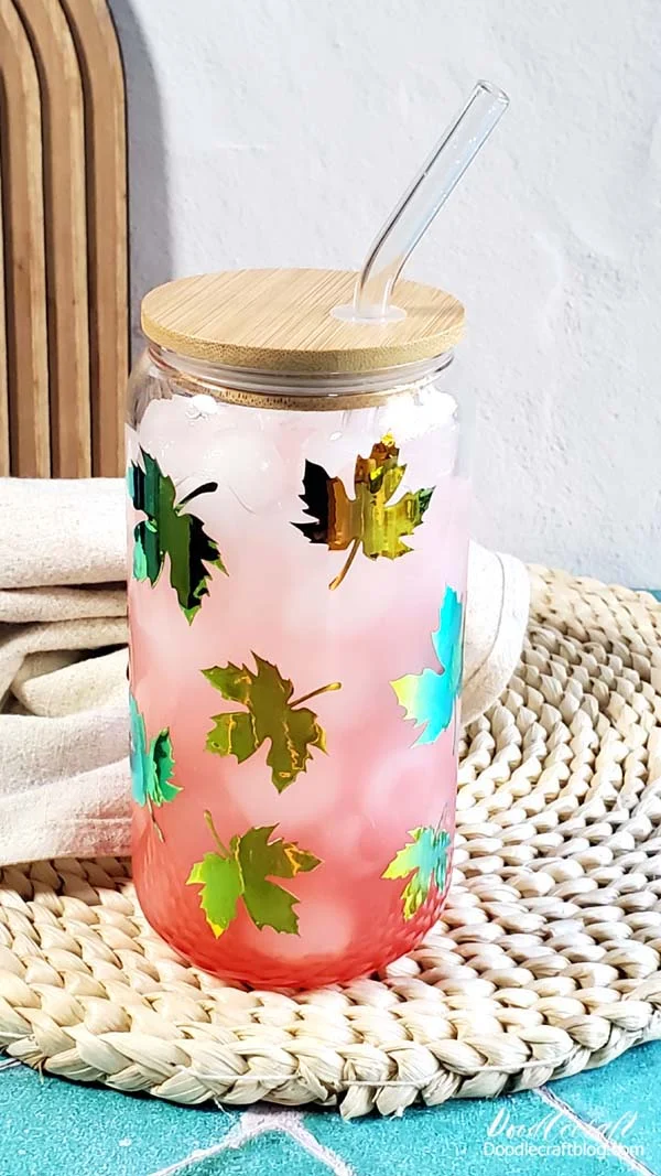 Holographic Vinyl Autumn Leaf Glass Can with HTVRONT Then fill your glass can with a tropical mocktail...or cocktail. Something so refreshing and yummy you'll feel like you are on the beach in Costa Rica, Dominican Republic, Cayman Islands, British Virgin Islands, Solomon Islands, Cook Islands, Christmas Island or Cape Verde! Check out this drink recipe here, it's my favorite! Tropical Fruit Punch Island Drink! These darling glass can tumblers with bamboo lids are also a great seller if you are looking for a little peak periods holiday hustle.