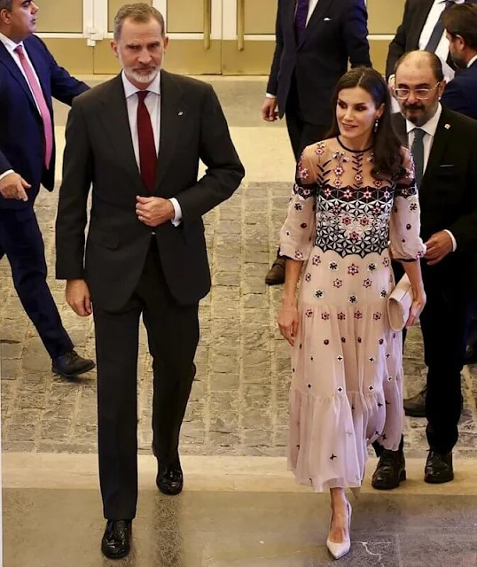 Queen Letizia wore a Finale eggshell floral embroidery tulle midi dress by Temperley London. Tous Beethoven earrings
