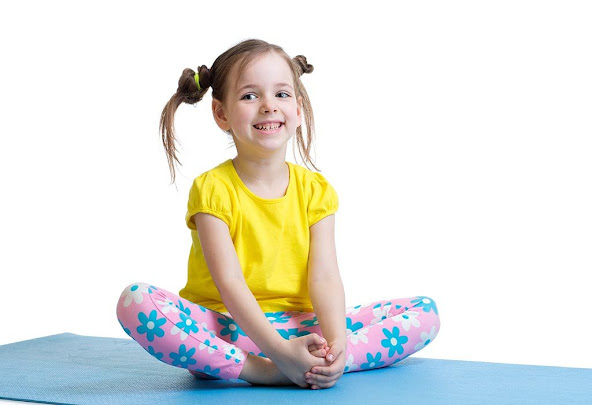 Kid doing butterfly pose