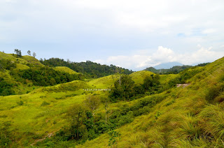 Lereng-lereng hijau di seberang Bukit Pulisan, Likupang Timur, Minahasa Utara, Sulawesi Utara +jelajahsuwanto