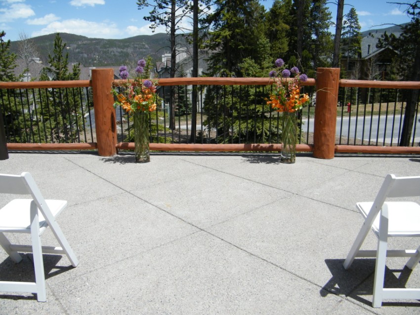 Tall Cylinder vases were used in the ceremony arrangements 