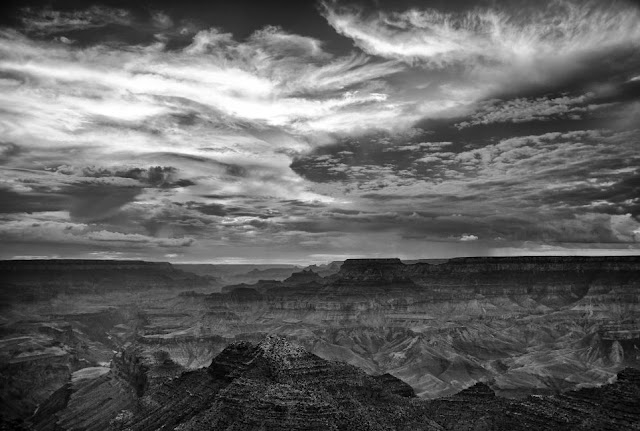 The gloomy sky starts to form over the Grand Canyon as late summer conditions begin create variable weather over Nevada