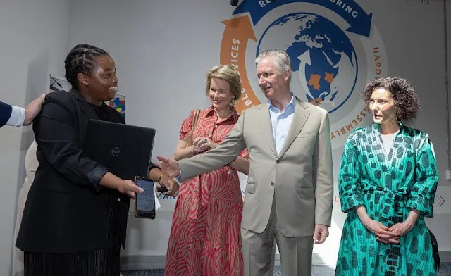 Queen Mathilde wore an animal print midi dress by Marie Mero. The Queen wore a new multi color midi dress by Caroline Biss