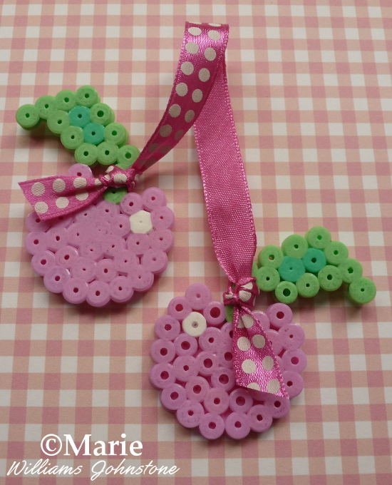 Full photo instructions on how to make cherry perler bead with ribbon embellishments craft crafting pegboard