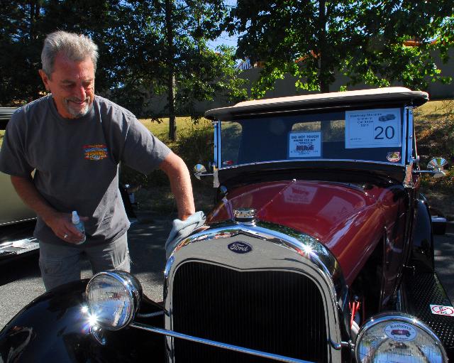  Kirkland sprays detailing wax on his 1929 Ford Model A roadster pickup