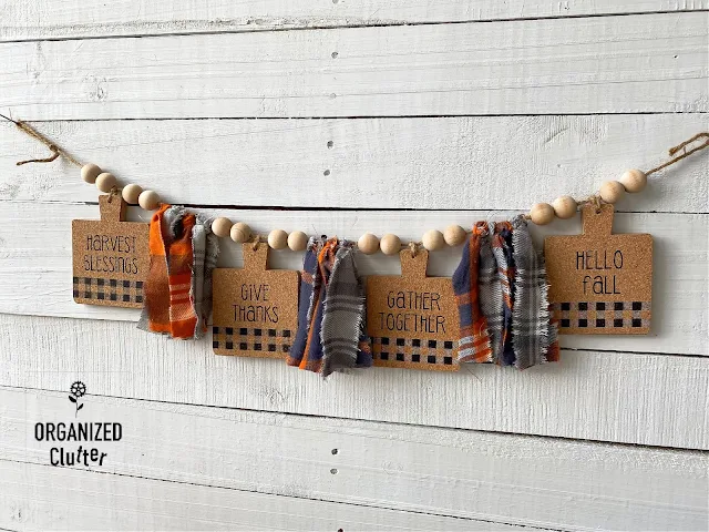 Photo of fall banner with jute, coasters, and plaid flannel.