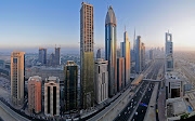 . Burj Park Island, and The Address Downtown Dubai hotel are at the center . (downtown dubai widescreen wide)