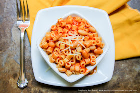 "Pasta Fazool" Recipe | -1 Box Ditalini Pasta - Olive Oil (enough to coat the bottom of the pan) - 3 1/2 cups/28 ounces of Tomato Sauce of choice* - 1 15.5 ounce can of Navy Beans or Northern Beans  - 1 Small Onion - Salt and Pepper to taste - Grated Parmesan