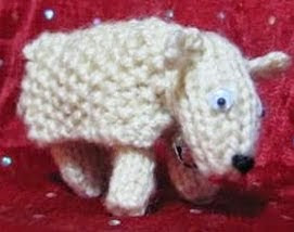 http://translate.google.es/translate?hl=es&sl=en&tl=es&u=http%3A%2F%2Fflutterbypatch.blogspot.com.ar%2F2009%2F05%2Fknitted-sheep-in-woolly-land.html