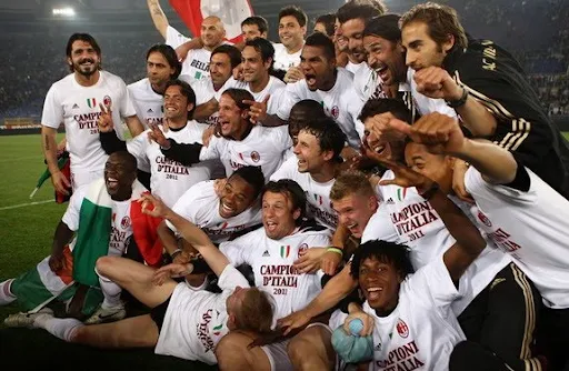 AC Milan players celebrate after winning the Scudetto