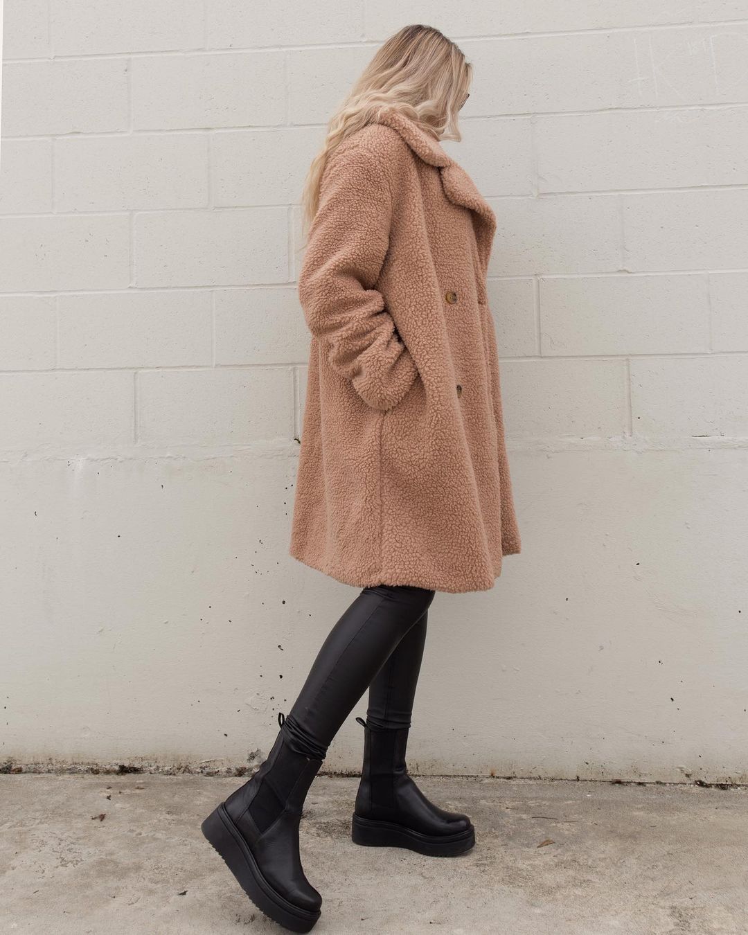 Teddy Coats are Still a Favorite Trend This Fall and Winter — @kimberly.schmalz in furry coat, black leather  leggings, and lug-sole boots