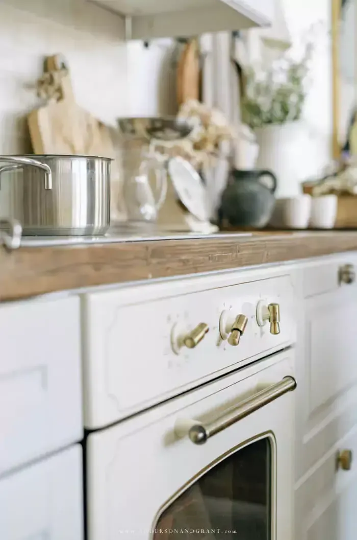 White oven with gold handles