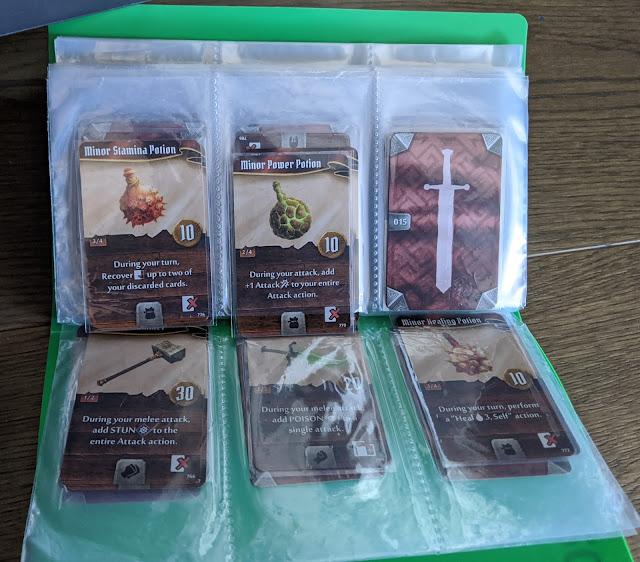 gloomhaven item shop, made with a business card folder