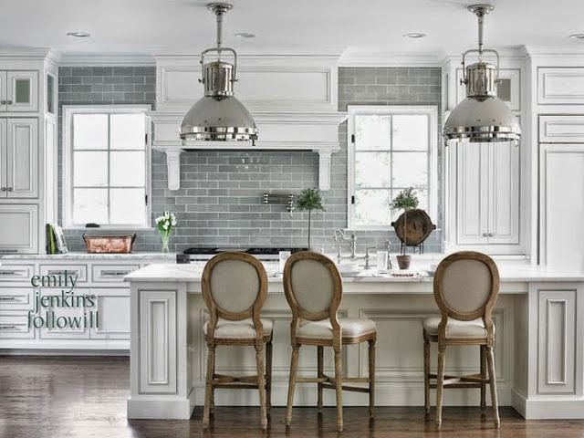 beautiful traditional white kitchen with gray subway tile dark hardwood floors silver pendant lights