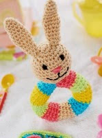http://www.letsknit.co.uk/free-knitting-patterns/bunny-rattle