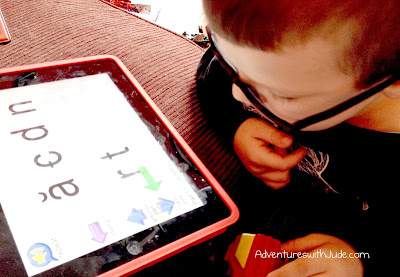 Jude practicing phonics sounds with the McGuffey App.