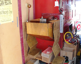 Music being fed through a fairground organ