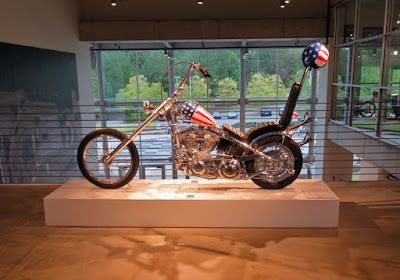 Capt. America motorcycle like the one in "Easy Rider" on display.