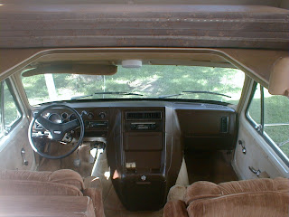 Driver and passenger seat, with bed over the top