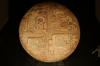 Chavin shamanic steatite stone plate with depiction of staff god for ritual herbs