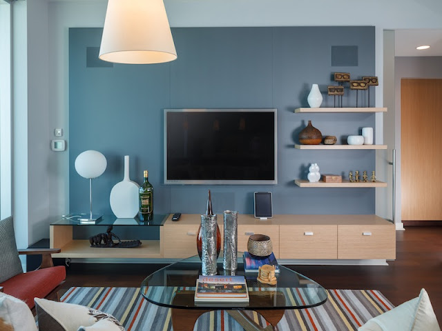 Picture of contemporary design in the living room with large tv on the wall