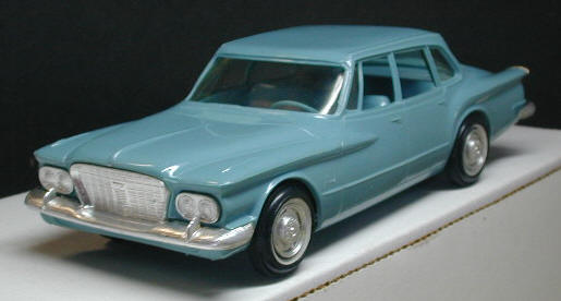 This 1960 4door Valiant is shown in Twilight Blue not the pea green of 