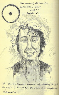 Handwritten text surrounds a drawn headshot of a grinning man with unkempt curly hair, in a jacket with handkerchief. he smiles mischievously. In the lefthand corner is a circle emblem with a dot in the center.